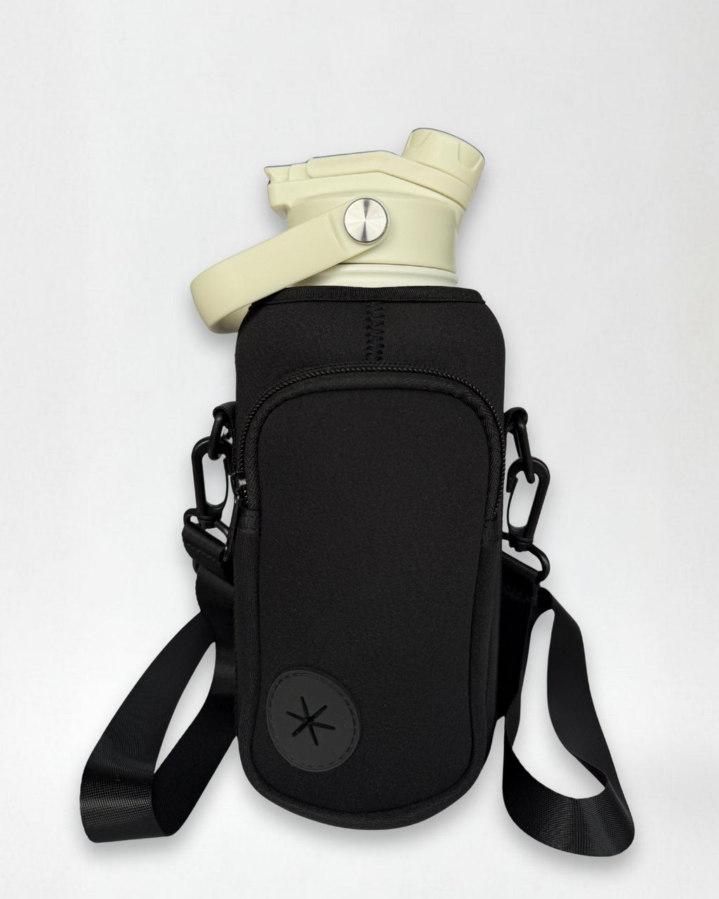 Black water bottle holder with white water bottle on a white background