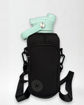 Black neoprene bottle bag with a aqua blue bottle on white background